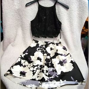 A.BYER 2 piece Crop top and Skirt set. NWT Size 7. Black sequin halter, hi lo sk